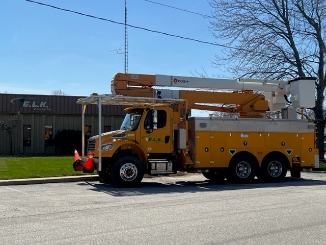 E.L.K. Energy bucket truck parked in front of the E.L.K. building
